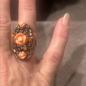 Elegant Floral Ring with Orange Accents